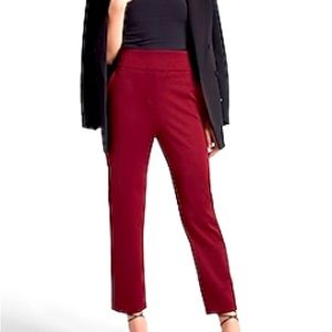 Express women's wine colored super high waisted nylon pull on ankle pant.